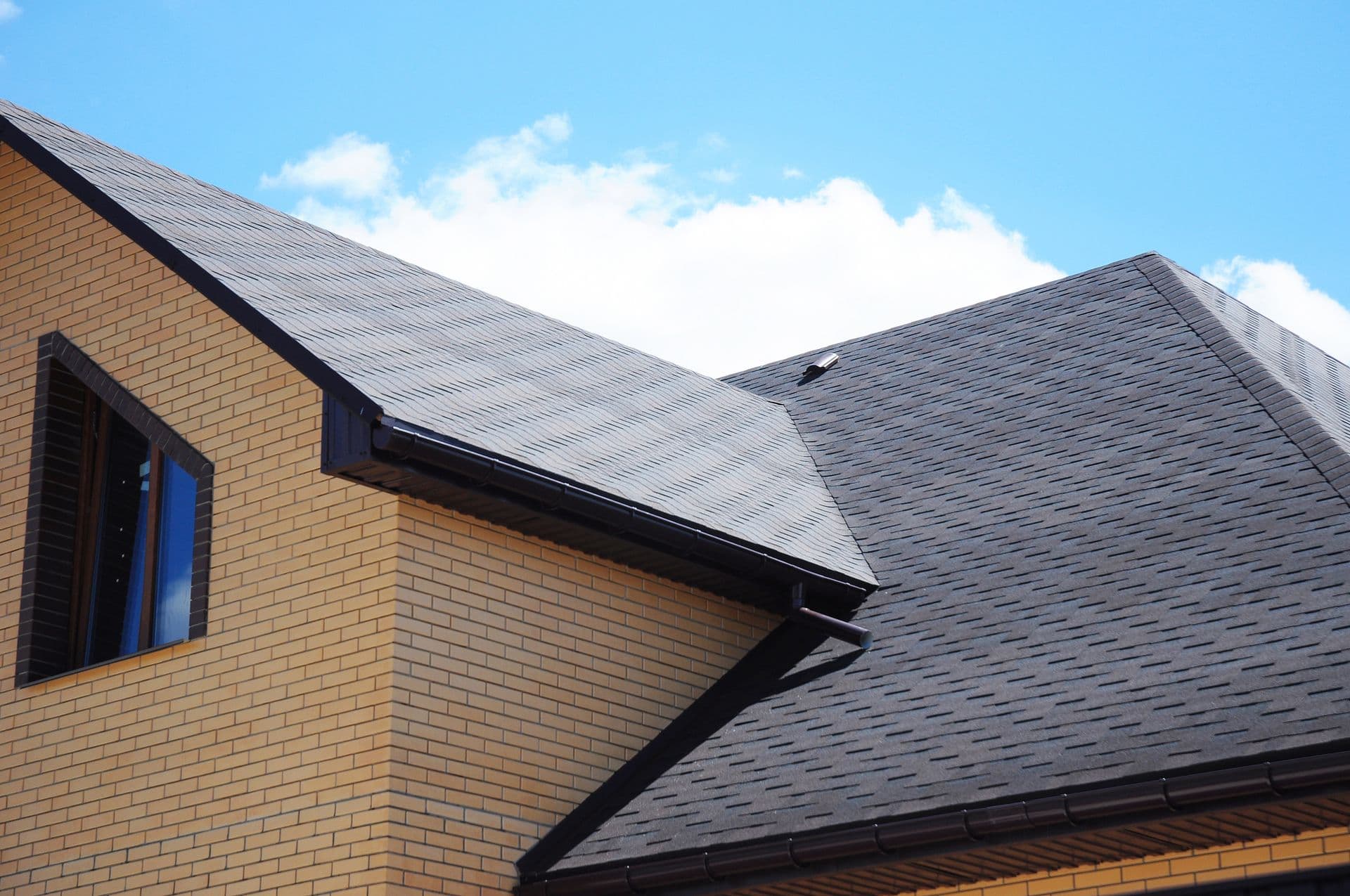 bigstock-Asphalt-Shingles-House-Roofing-254453371.jpg