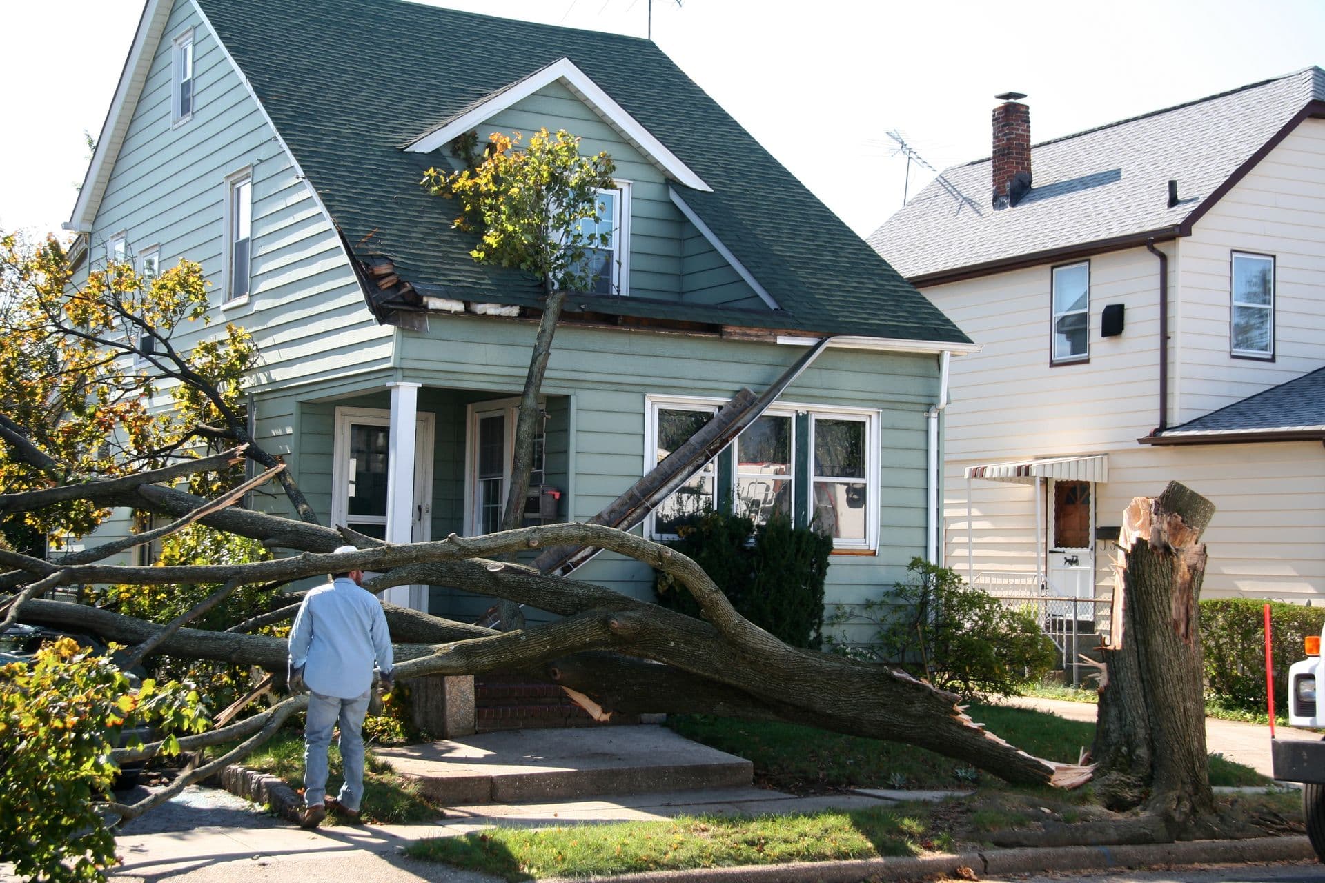 bigstock-Damaged-House-From-Tree-1113138.jpg