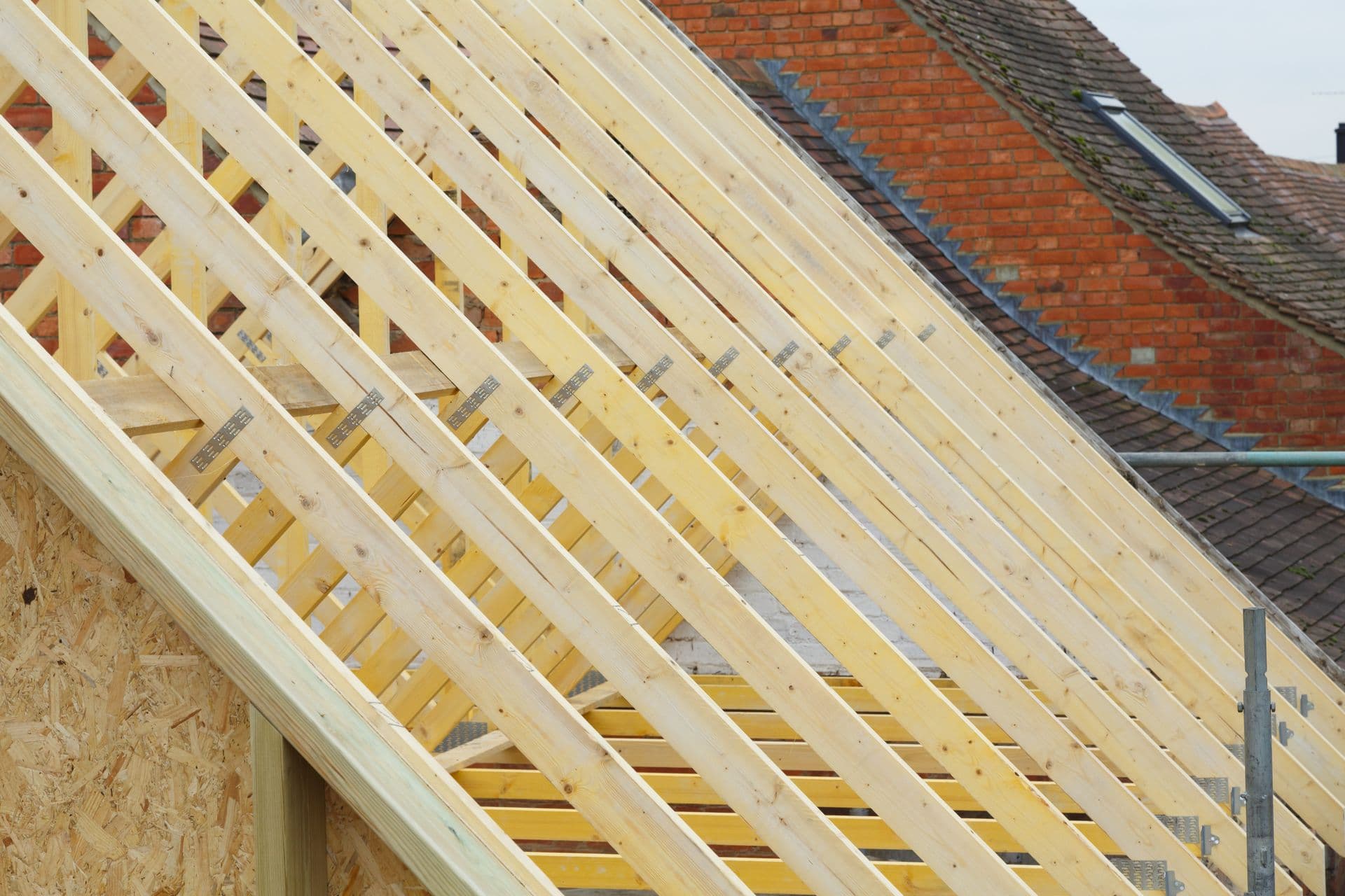 bigstock-Detail-Of-New-Timber-Roof-Trus-286603450.jpg